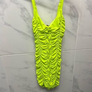 Neon green ruched bodycon dress